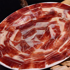 ¿Puedo conservar una ración de jamón ibérico después de cortada?