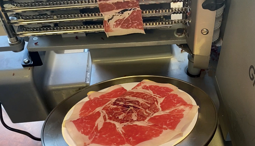 Cómo funciona una máquina industrial de lonchear jamón