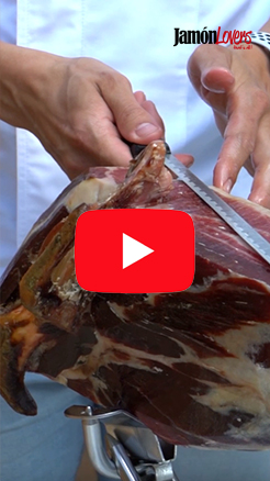 ¿Qué aspectos técnicos debo tener en cuenta al cortar un jamón en función de por dónde salga el hueso de la cadera?